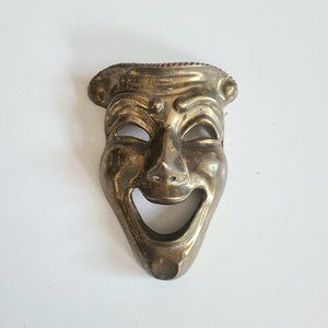 Vintage solid brass theater comedy mask.